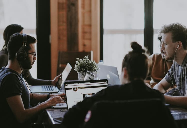 Photo of people at work by Annie Spratt on Unsplash